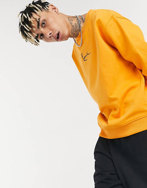 Karl Kani Signature small logo sweatshirt in orange | ASOS