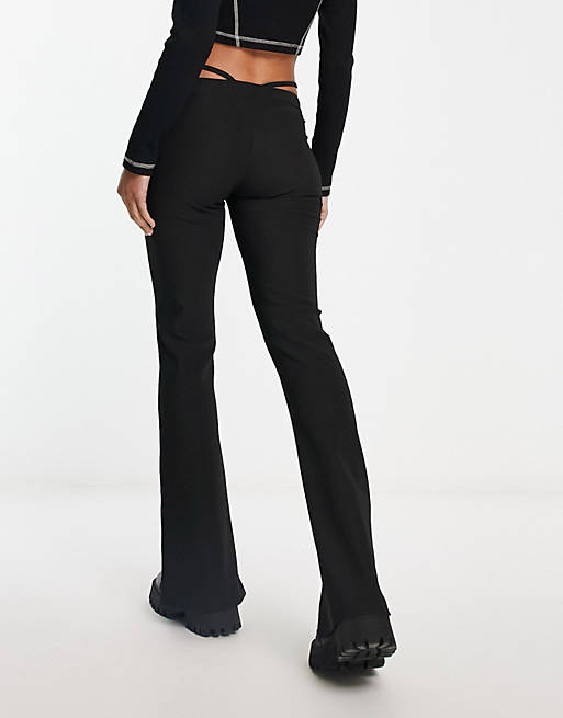 Karl Kani small signature flared leggings in black with hip string detail
