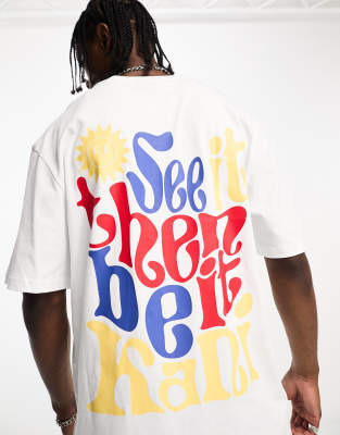 Karl Kani Karl Kani small signature oversized t-shirt in white with slogan back print
