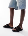 Karl Kani street sliders in black