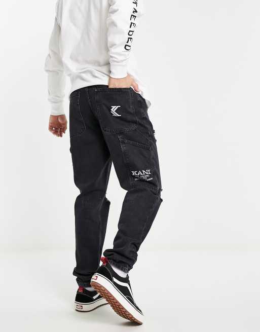 Karl Kani tapered workwear distressed jeans in black | ASOS