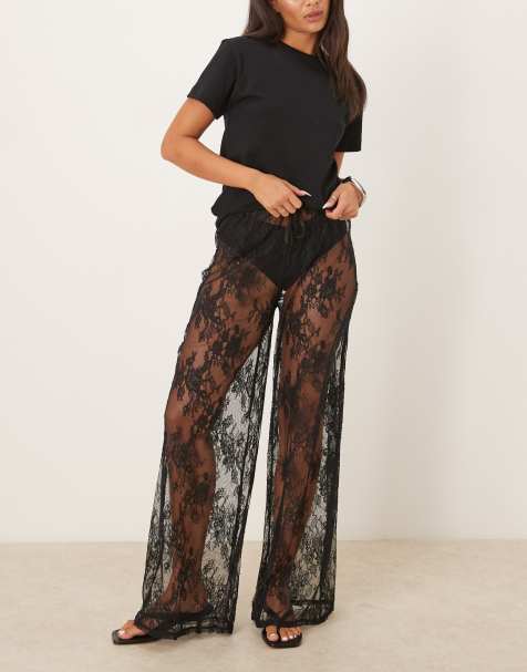 Kat The Label Lottie sheer lace loose fit trousers in black - view 1
