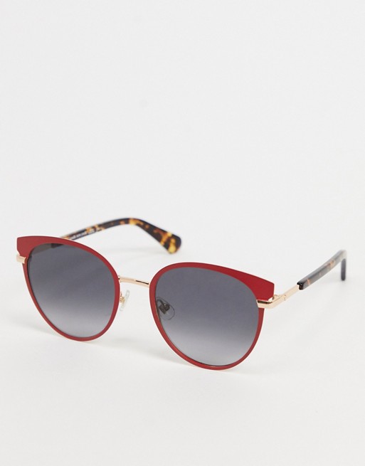 Kate Spade cat eye sunglasses in red with tortoise shell tips