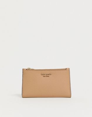 Kate Spade - Smalle beige portemonnee met klep en ritssluiting aan de bovenkant-Roze