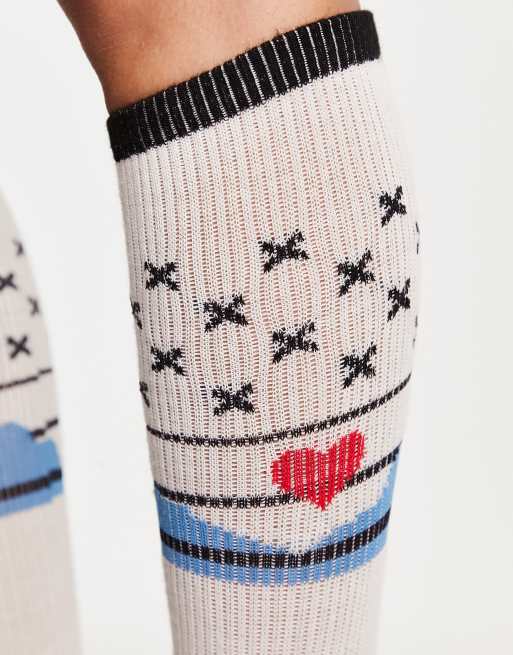 Kavu Moonwalk mountain print socks in off white ASOS