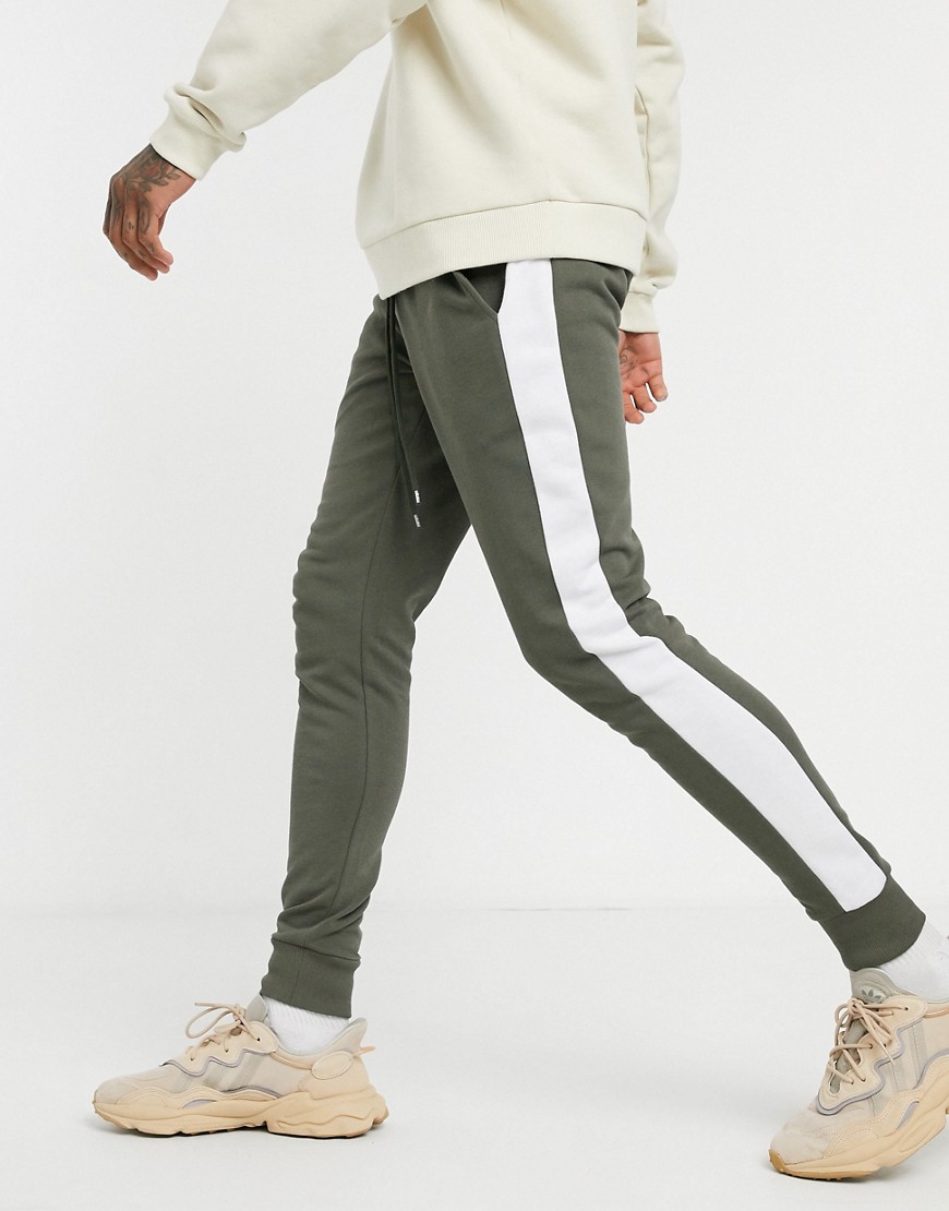 Khakifarvede joggingbukser i skinny pasform med sidestribe fra ASOS DESIGN-Grøn