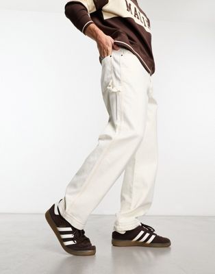 Kickers off white carpenter trousers with side logo
