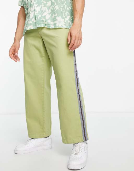 Kickers skate leg pants with side stripe in green