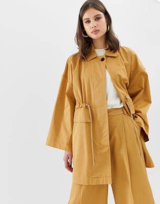 Kings Of Indigo - Regenmantel mit verzierter Taille - Kupfer