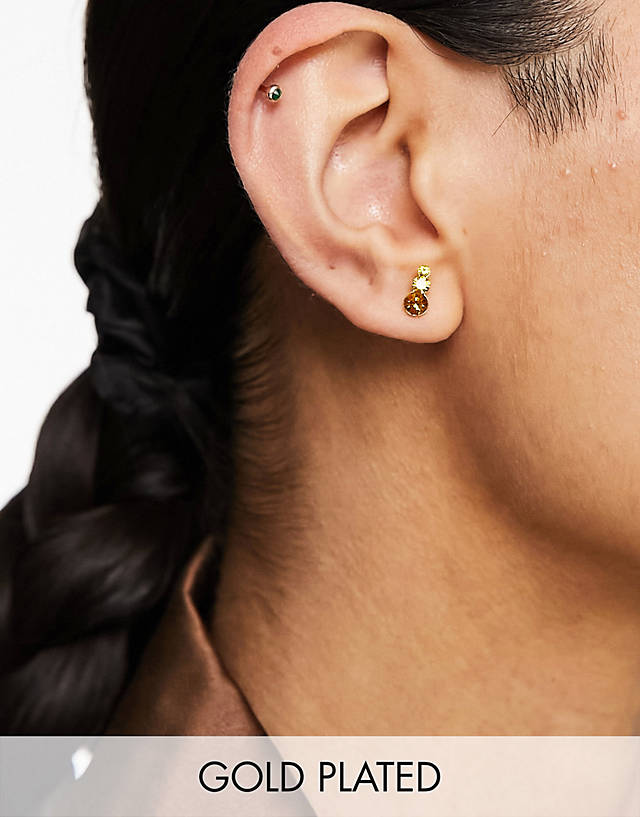 Kingsley Ryan - gold plated treble drop amber earrings