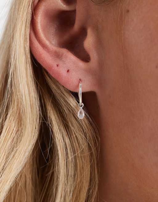 Kingsley Ryan hoop earrings with teardrop crystal charm in