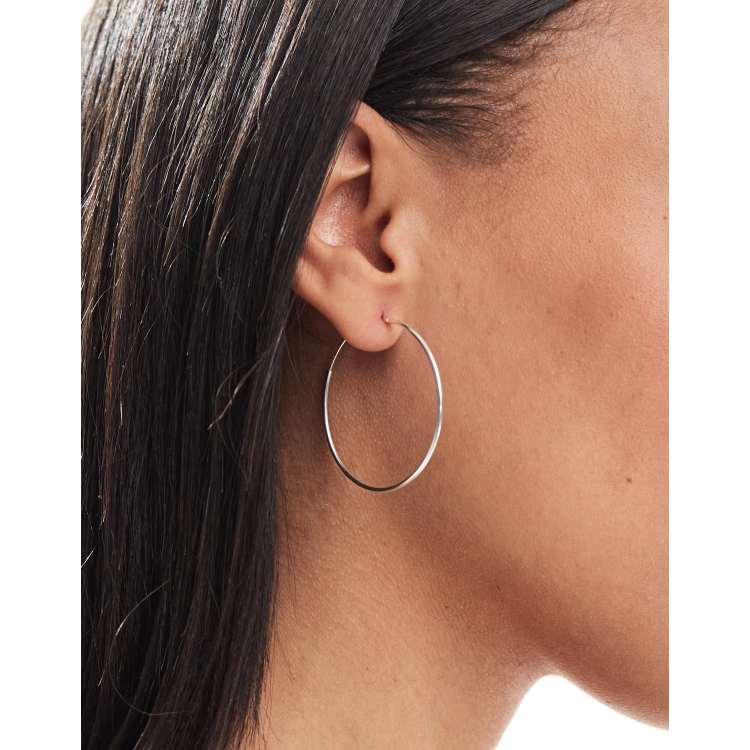 Orecchini a cerchio grandi con pompon in argento sterling - Italia