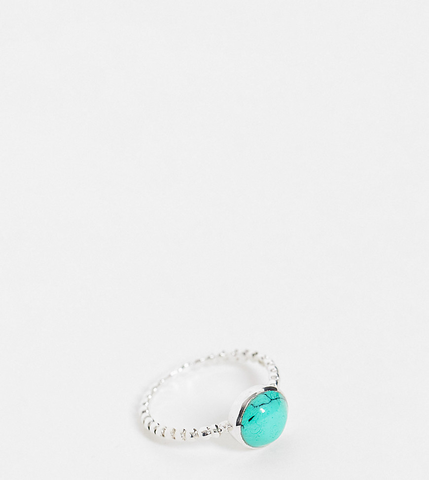 Kingsley Ryan ring with twisted band and turquoise stone in sterling silver