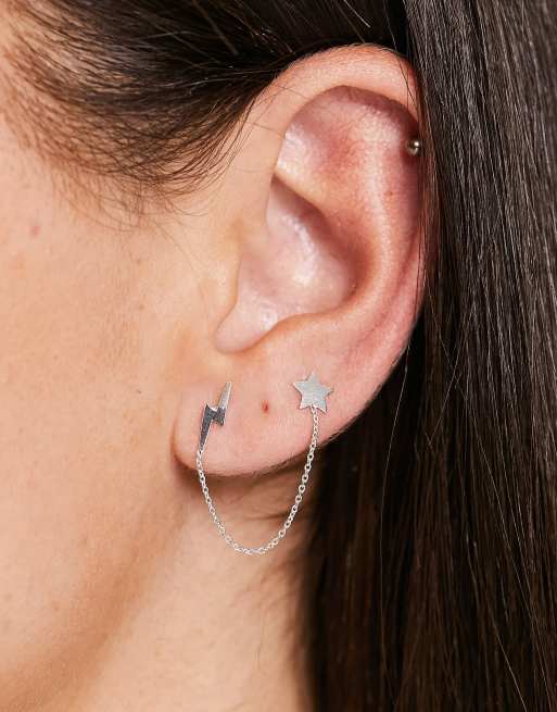 Kingsley Ryan – Stiftörhänge med blixt- och stjärndesign och kedja emellan av sterlingsilver
