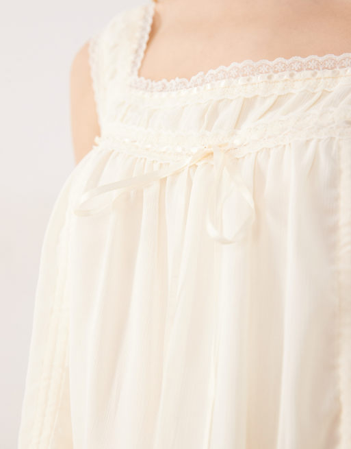 Kiss The Sky – Angeline – Babydoll-Oberteil in Cremeweiß mit Rüschen, 4 von 4