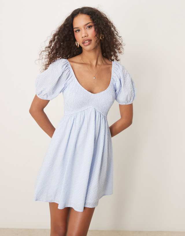 blue and white babydoll dress Kiss The Sky shirred mini in Gingham