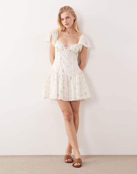 Kiss The Sky Bella flutter sleeve floral mini dress in white - view 1