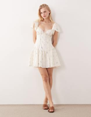 The Sky - Bella - Robe courte à fleurs et manches évasées - Blanc 44
