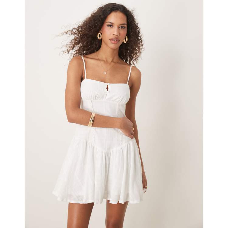 Kiss The Sky cami mini dress in textured white check | ASOS