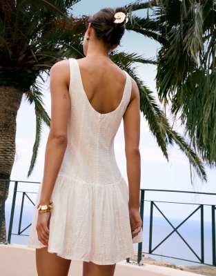 Kiss The Sky dropped waist mini vest dress in white