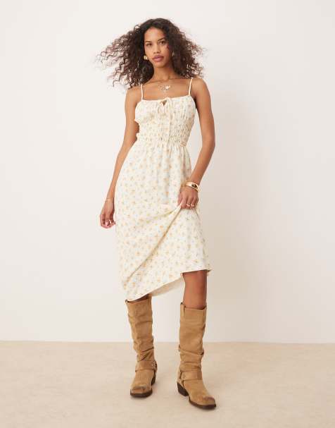 Kiss The Sky - Gesmokte midi-jurk met gele bloemenprint - view 1
