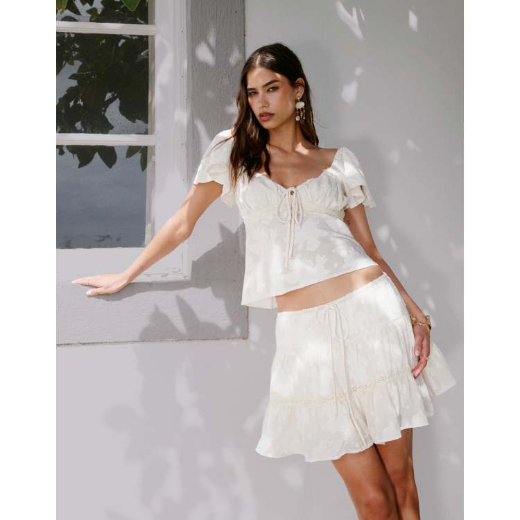 Kiss The Sky jacquard tiered mini skirt in cream | ASOS