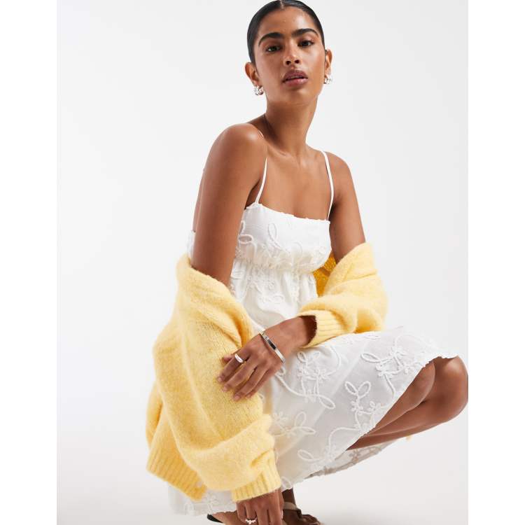 Kiss The Sky Lucie eyelet babydoll mini dress in white | ASOS