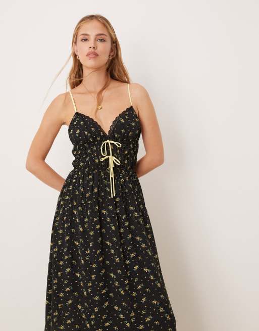 Kiss The Sky - Mouwloze maxi jurk met V-hals in zwarte bloemenprint