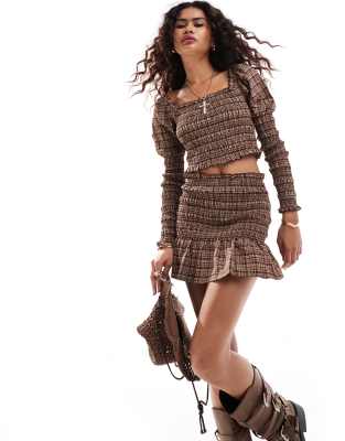 Kiss The Sky Ruched Mini Skirt In Brown Plaid