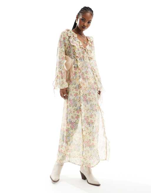 Kiss The Sky sheer maxi dress with ruffles and tie cuffs