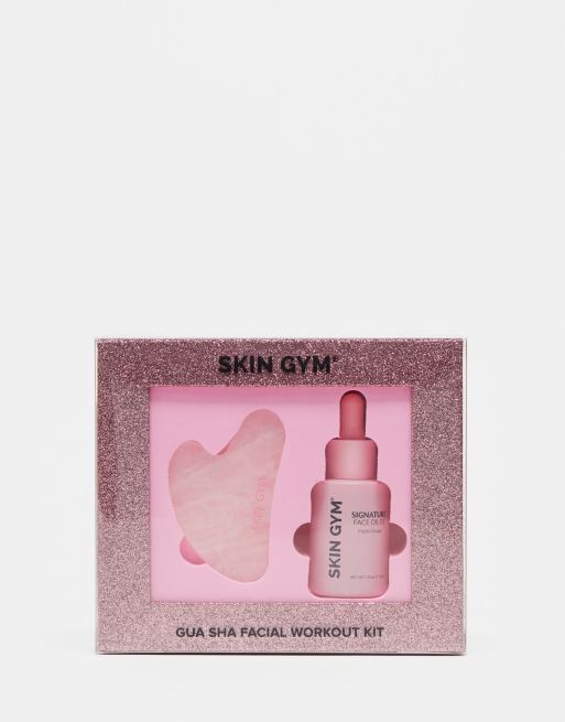 Kit para ejercicios faciales con gua sha de cuarzo rosa y aceite facial Signature de Skin Gym
