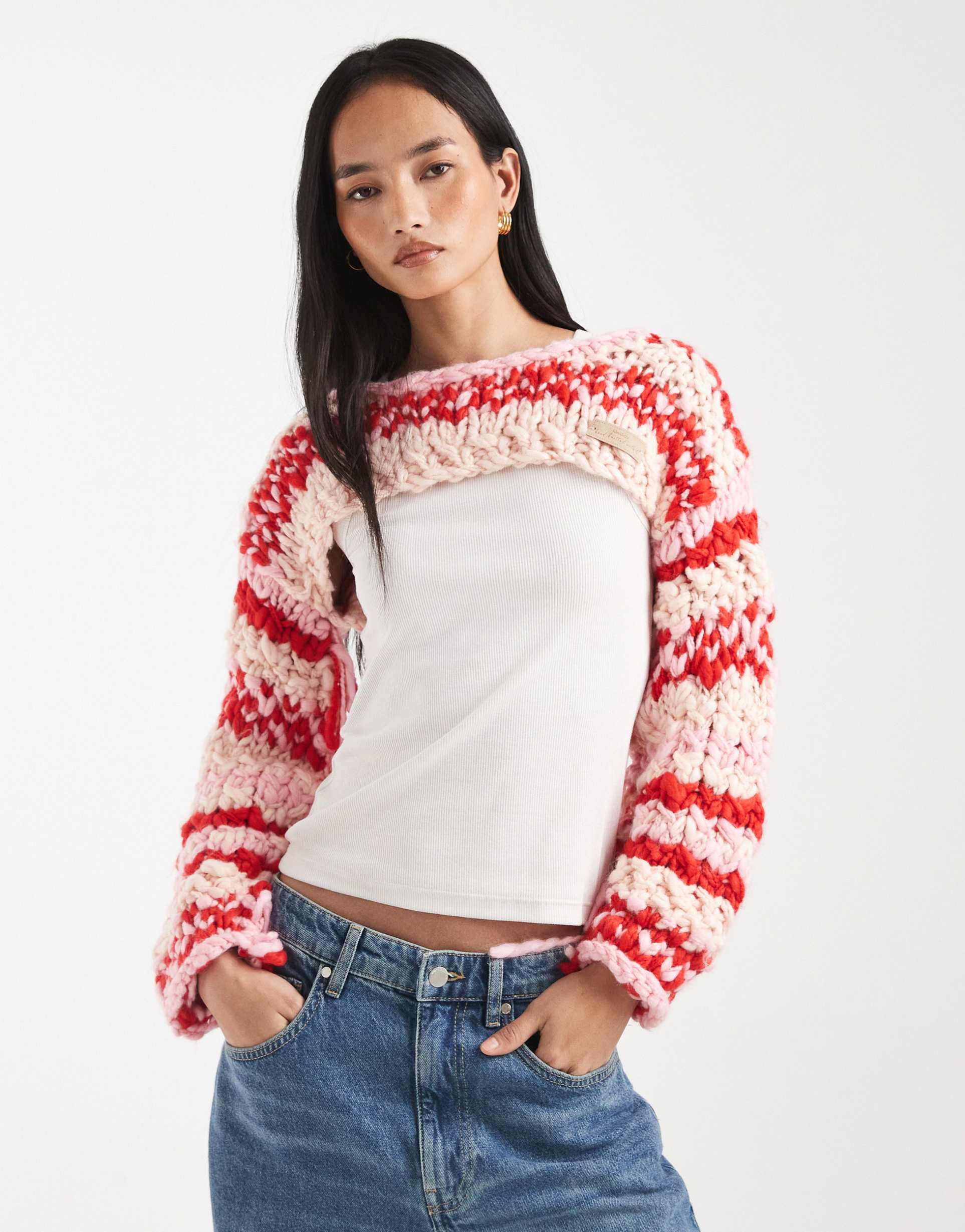 kiwi & co pixie contains wool hand knit chunky knit fringe sleeve detail shrug sweater in pink stripe