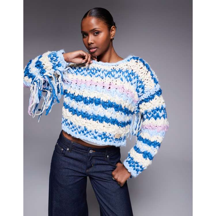 Kiwi & Co Pixie contains wool hand knitted chunky knit fringe arm