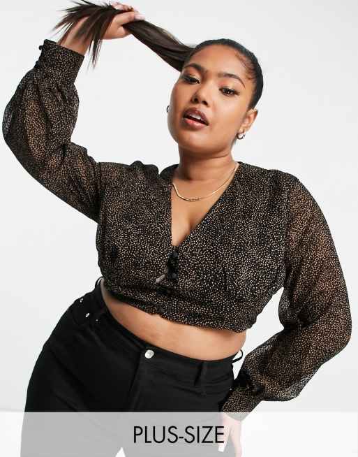 Koco & K – Plusstorlek – Småmönstrad crop top med volymärmar