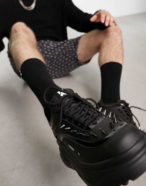 KOI Bane chunky spike detail sneakers in black | ASOS