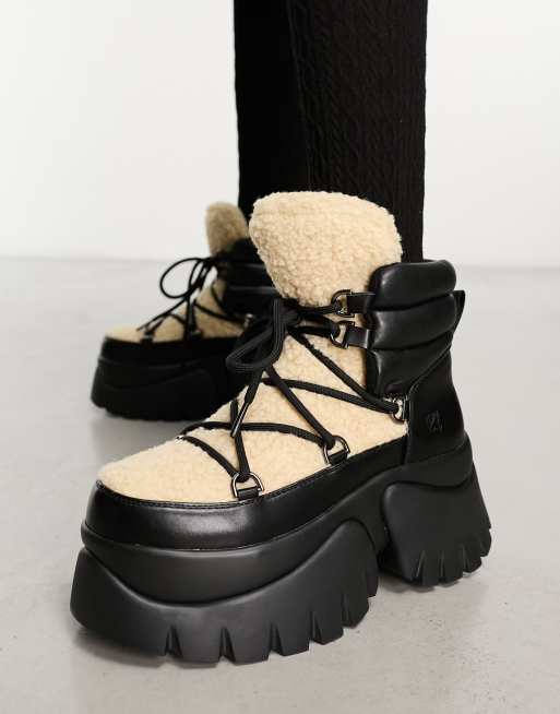 Womens fluffy winter on sale boots