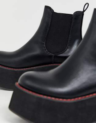 black boots with red stitching