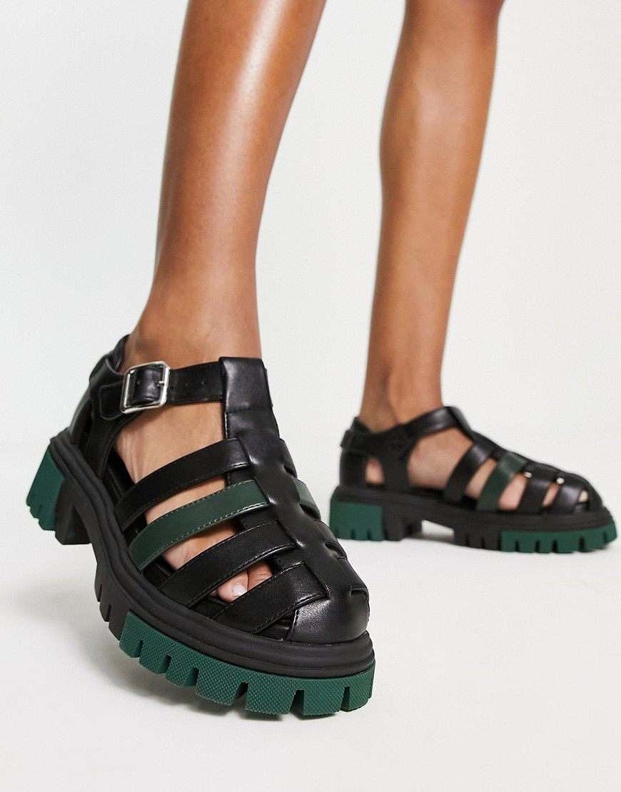 Koi Footwear gladiator sandal in black with green sole