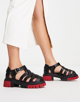 Koi Footwear gladiator sandal in black with red sole