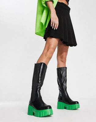 Koi Footwear knee boots with contrast sole in black and green