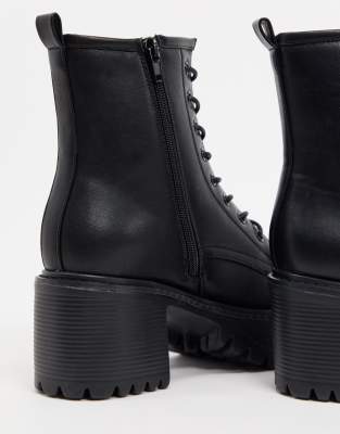 black ankle boots with metal detail