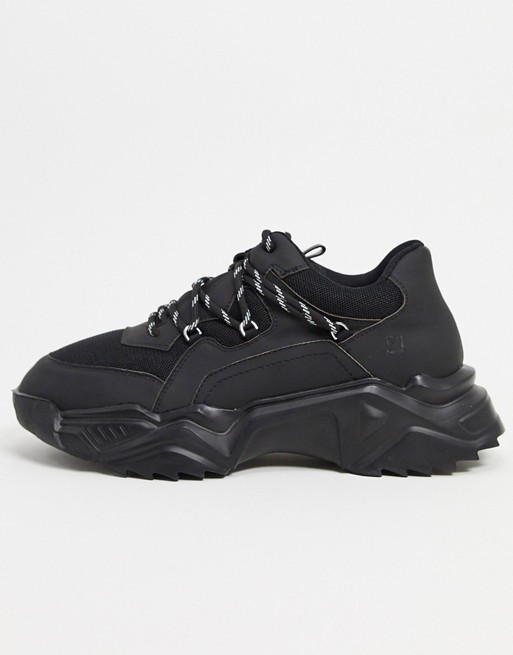Koi Footwear Vegan wolf chunky sole trainers in black