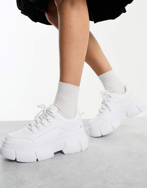 Chunky white store platform sneakers