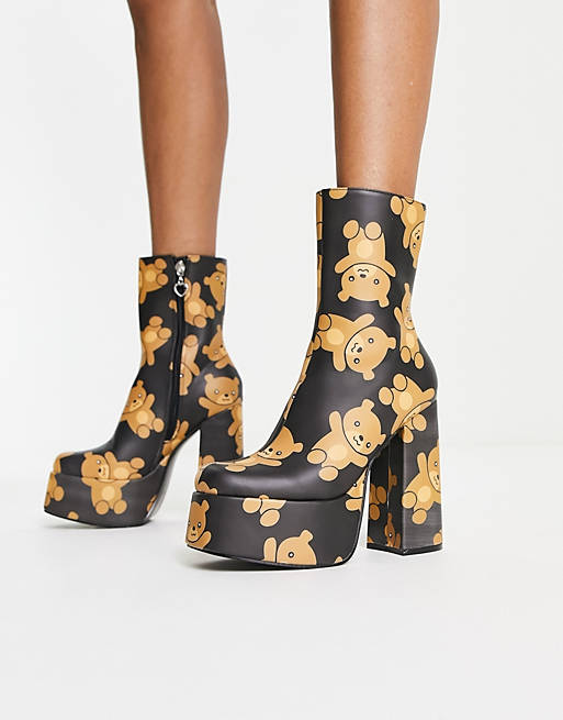 Koi Teddy platform heeled boots in bear print   