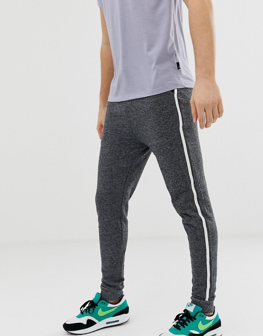 Koksgrå joggingbukser med skinny pasform og stribe i siden fra ASOS DESIGN