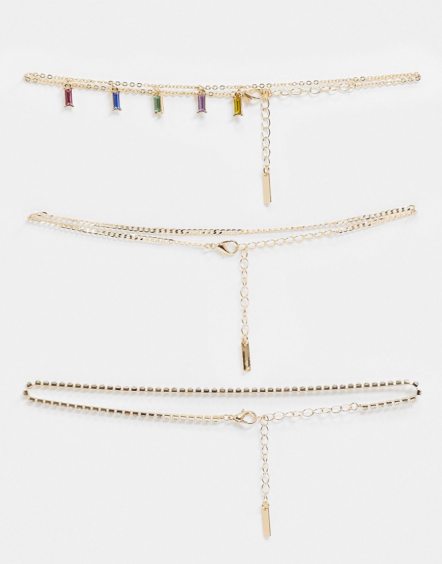 фото Комплект из 3 ожерелий-чокеров с золотистой цепочкой и радужными подвесками topshop-золотистый