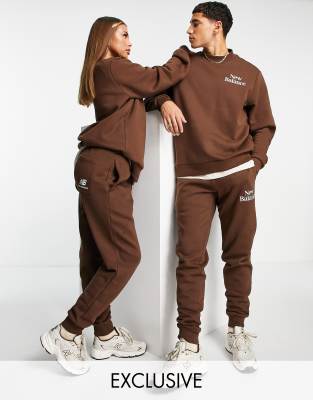 Спортивные брюки Коричнево-бежевые джоггеры New Balance Cookie-Коричневый цвет