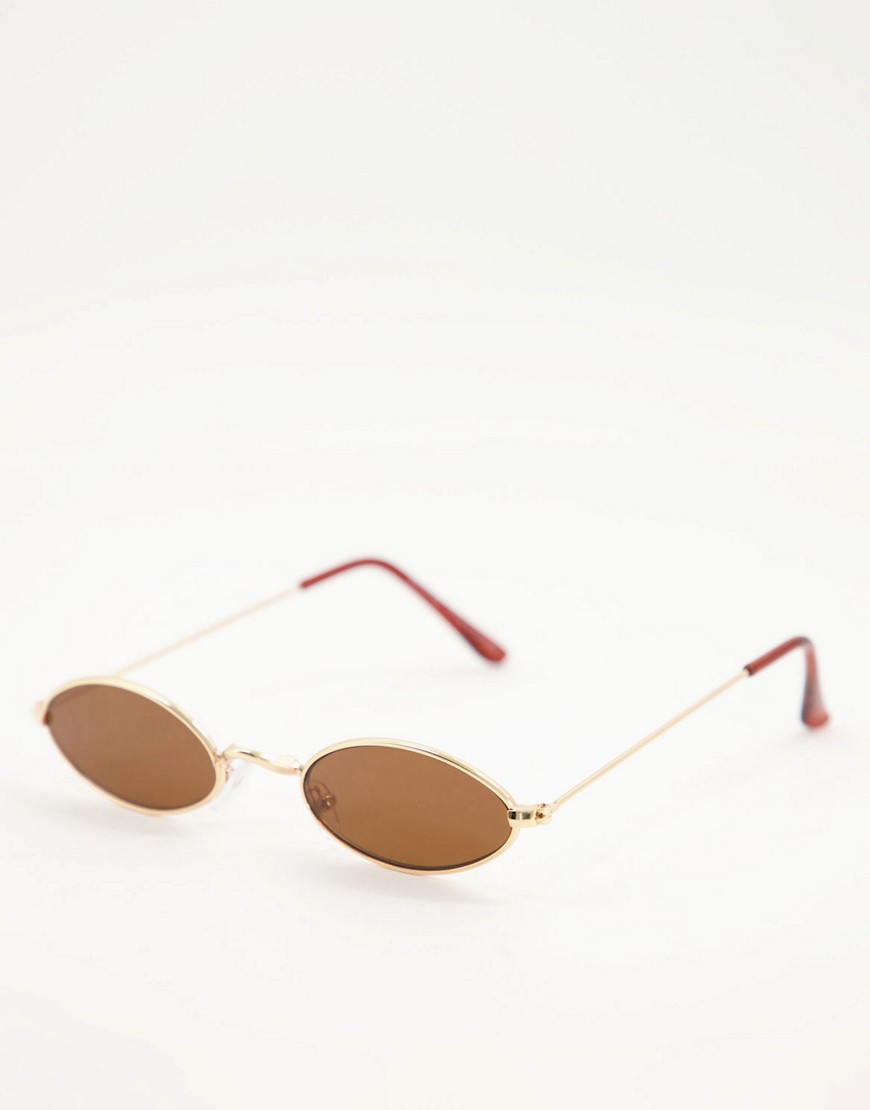 фото Коричневые солнцезащитные очки в золотистой овальной оправе bershka-коричневый цвет
