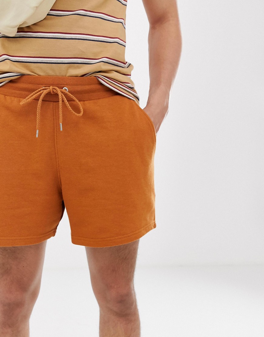 Korte afslappede shorts i mørk orange jersey fra ASOS DESIGN