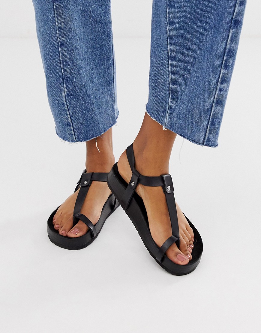 фото Кожаные сандалии в минималистском стиле с петлей для большого пальца asos design filmore premium-черный